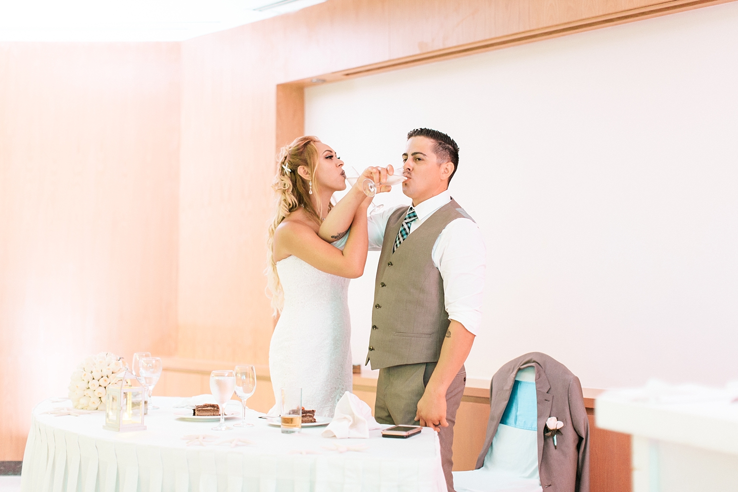 newlyweds toast at Grand Oasis Cancun